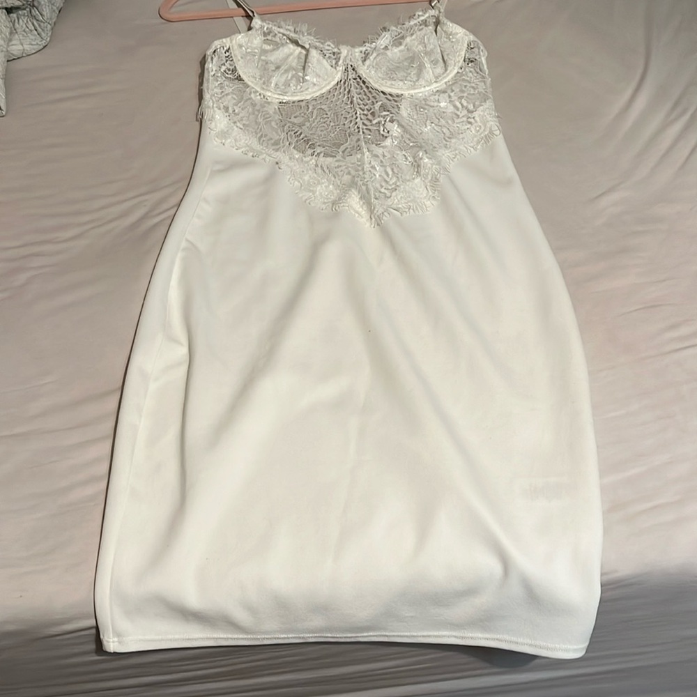 White sexy dress. Wore it once as a Halloween costume.